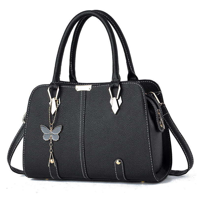 Sac à main avec breloque papillon – Élégant & structuré