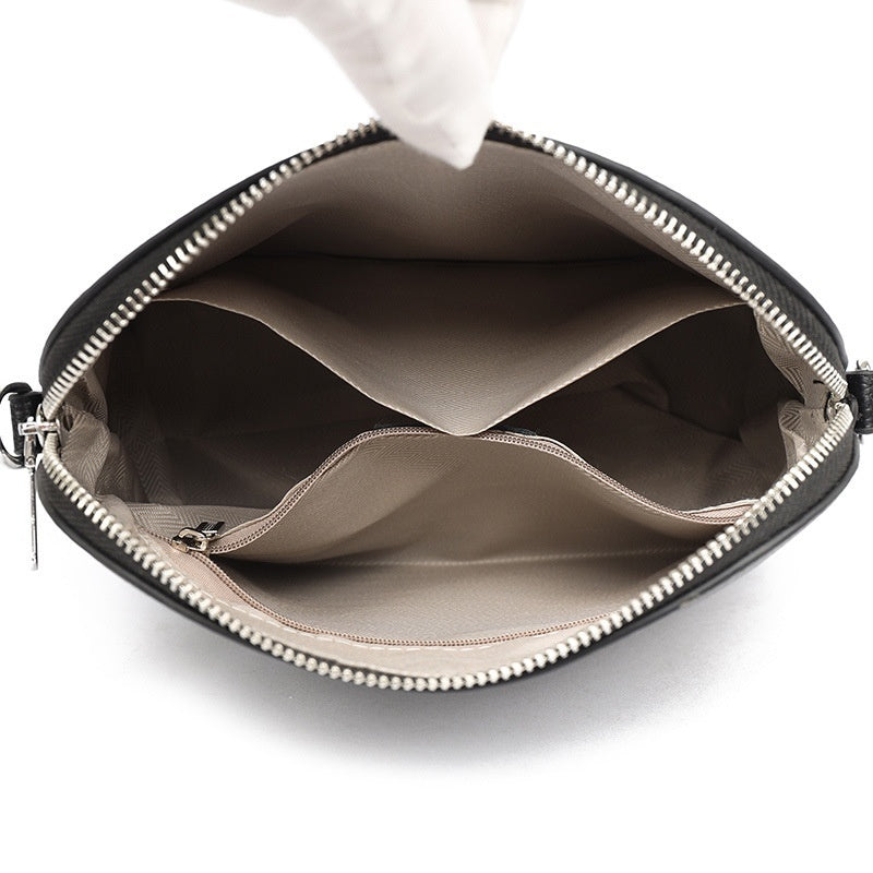 Sac bandoulière en cuir synthétique texturé