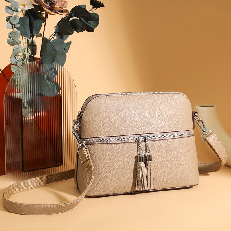 Sac bandoulière en cuir synthétique texturé