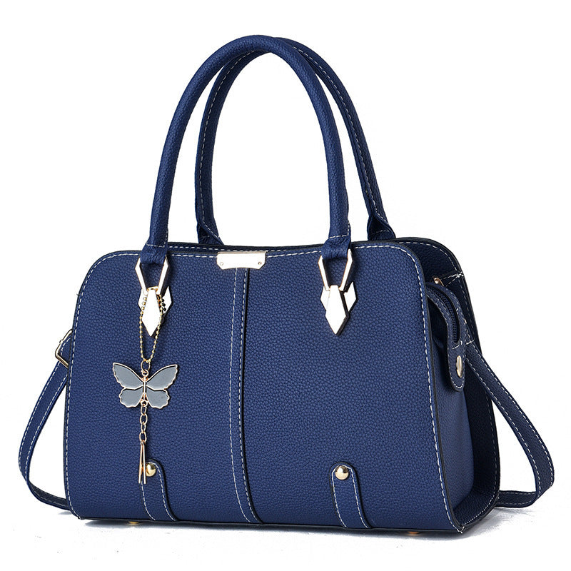 Sac à main avec breloque papillon – Élégant & structuré