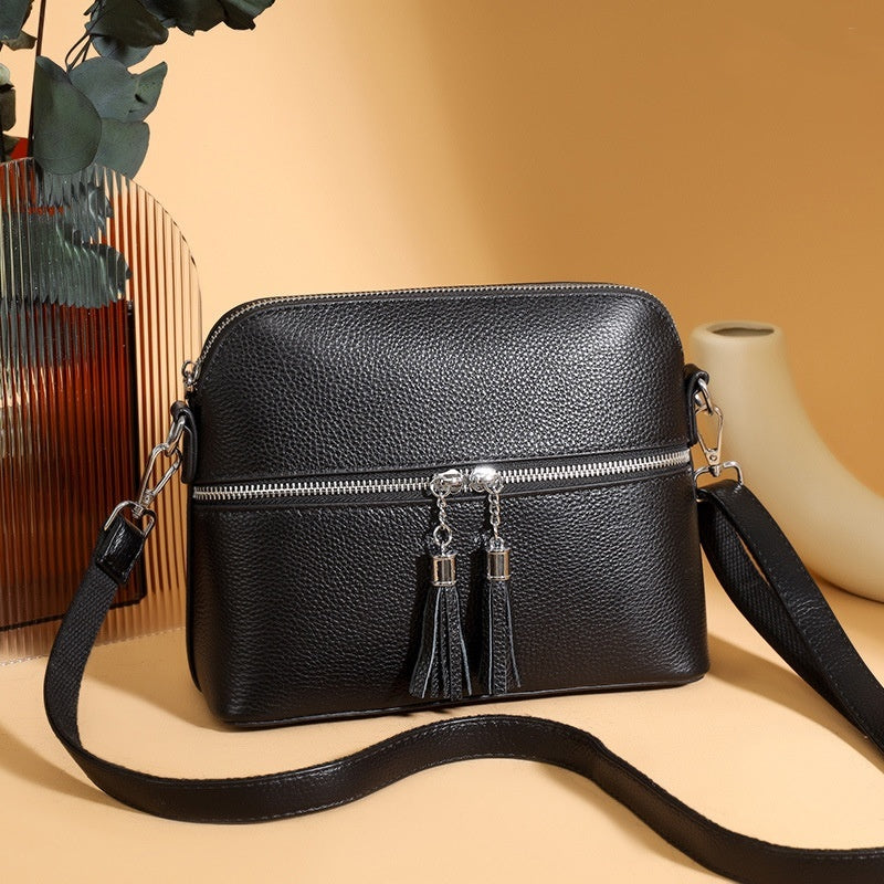 Sac bandoulière en cuir synthétique texturé