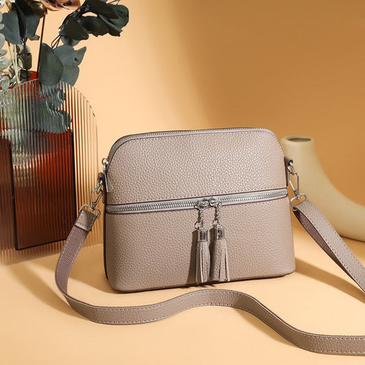 Sac bandoulière en cuir synthétique texturé