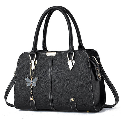 Sac à main avec breloque papillon – Élégant & structuré