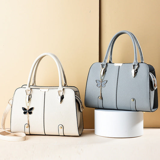 Sac à main avec breloque papillon – Élégant & structuré