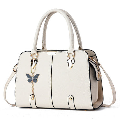 Sac à main avec breloque papillon – Élégant & structuré